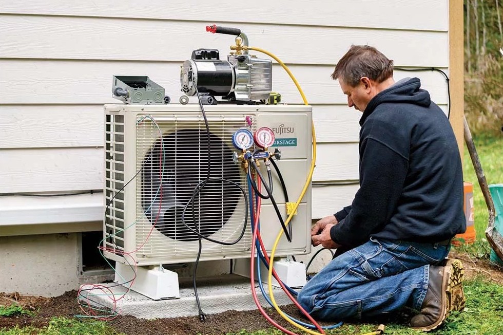 Mark Corna Heating and Cooling team at a residential job site in Shelton, CT